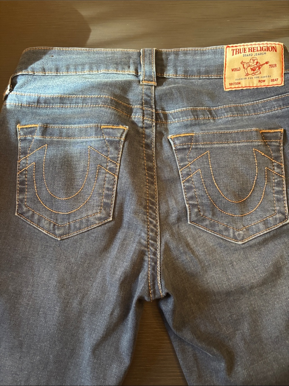 True Religion Women’s Blue slight flare with Signature Back Pockets